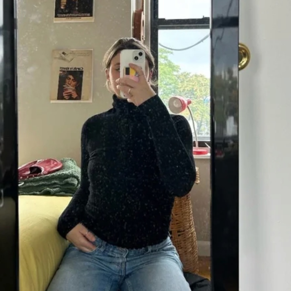 tight fitting black long sleeve turtle neck